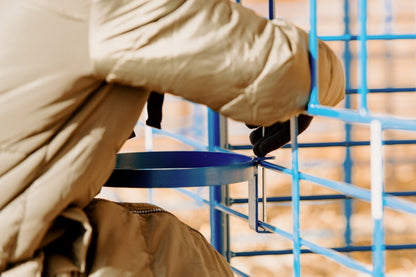 Detail view of lambing pen connection and adjustable components for sheep and goats