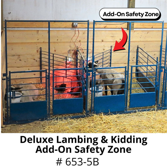 A blue metal safety pen enclosure with wooden panels and straw bedding, shown with sheep inside. Text overlays read 'Add-On Safety Zone' and 'Deluxe Lambing & Kidding Add-On Safety Zone # 653-5B'.