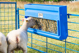 PolyHayGrainpolyhaygrainfeeder-sydell-sheep-goat-farm-handling-equipment-feeder-trough-hangingfeeder-polyfeeder-plasticfeeder-lifestyle-photo-sheep