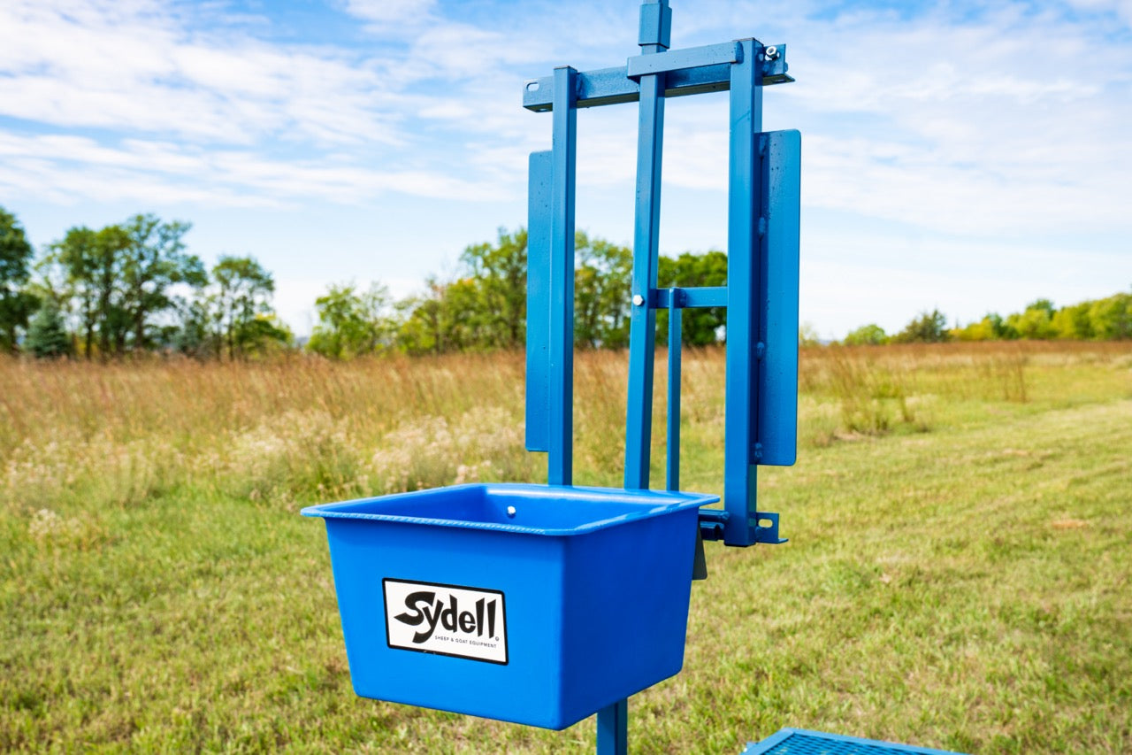 Detail view of hay feeder connection and adjustable components for sheep and goats