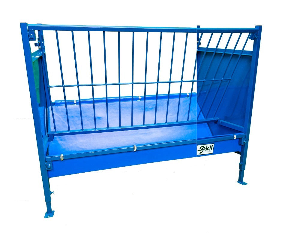 Starter Vertical Fenceline Feeders (815/817) installed in barn layout for efficient sheep and goat handling